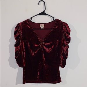 Deep red velvet shirt with puffed sleeves